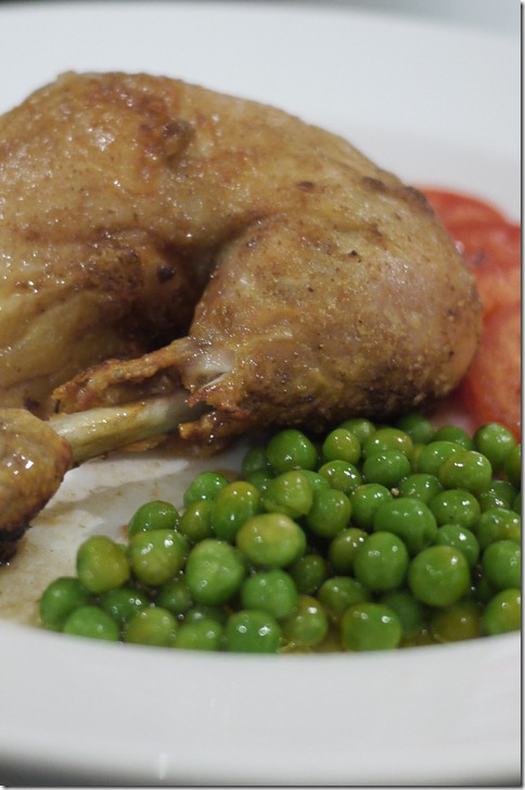 Roast chicken with peas and tomato salad