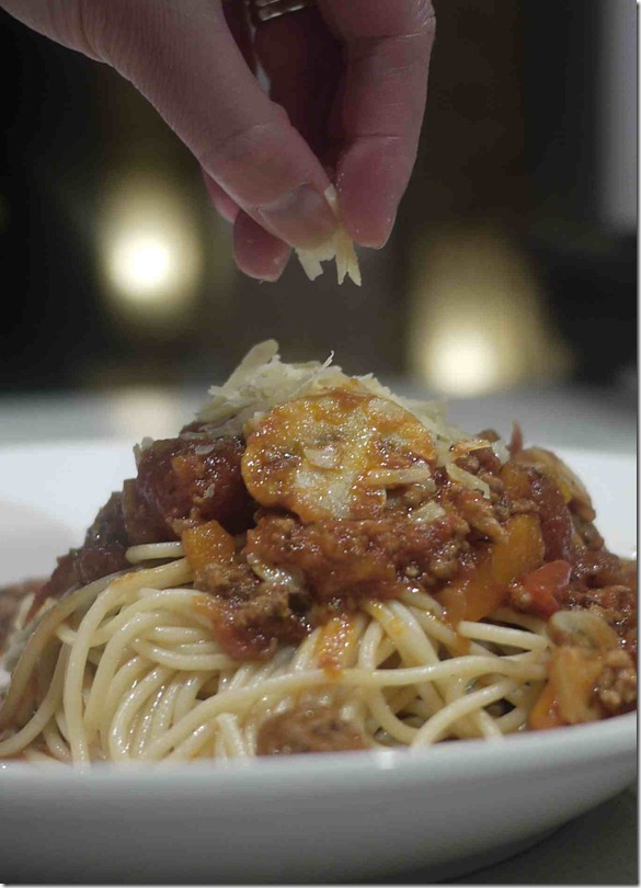 Spaghetti Bolognaise topped with grated parmigiano-reggiano