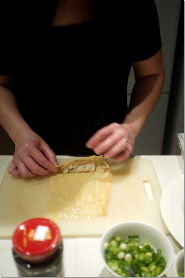 Wrapping fish paste with beancurd skin