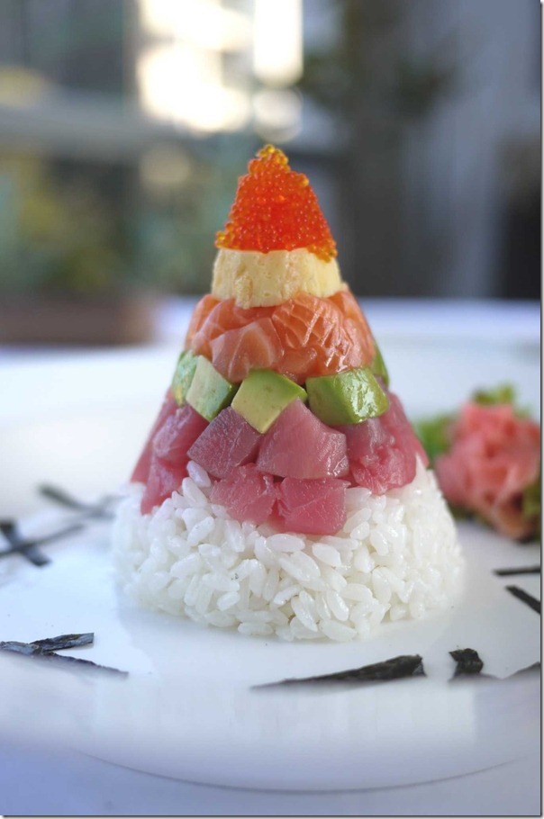 Chirashizushi - tobiko, omelette, salmon, tuna, avocado and sushi rice