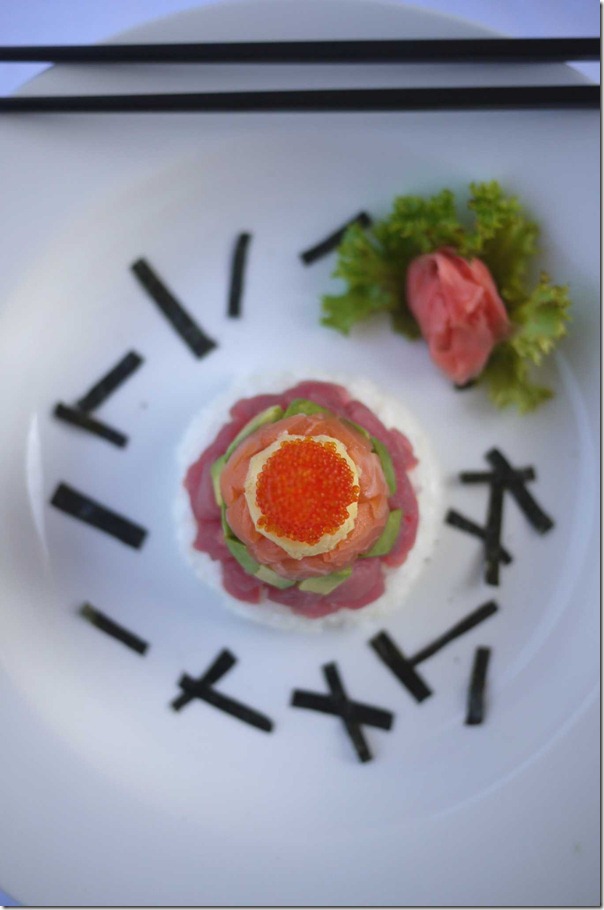Chirashizushi - tobiko, omelette, salmon, tuna, avocado and sushi rice
