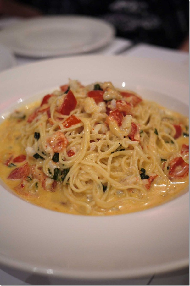 Angel hair pasta tossed with blue manna crab, tomato, chilli, basil and cream