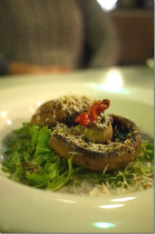 Roasted field mushrooms with rocket, garlic crumbs and shaved pecorino cheese
