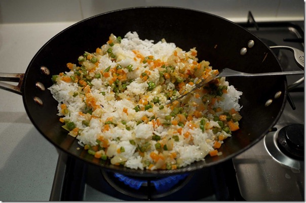 Add cold steamed rice and mix with the diced vegetables