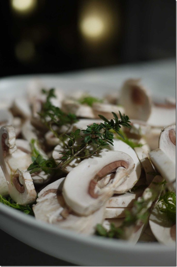 Thyme and sliced white mushrooms