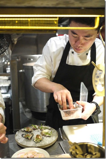 Finishing touches in the kitchen of Mr. Wong, Sydney