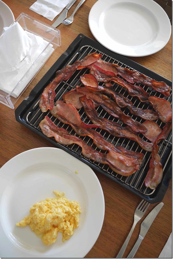 Scrambled eggs and grilled bacon