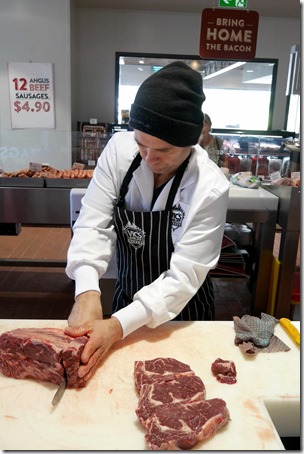 A butcher at work, Vic's Meat Market, Pyrmont