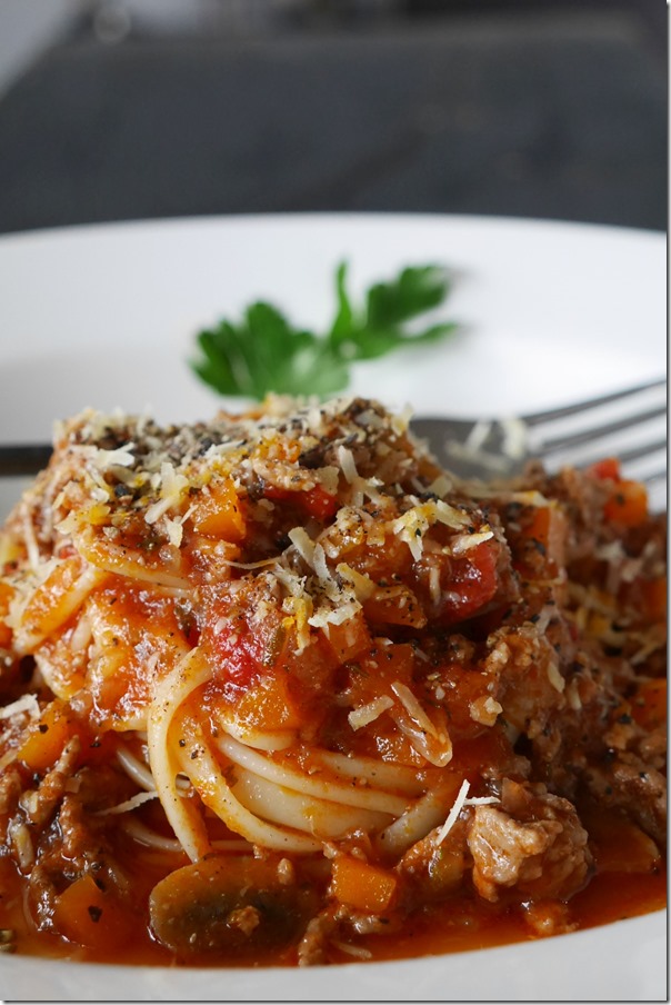 Spaghetti Bolognese with shaved parmesan