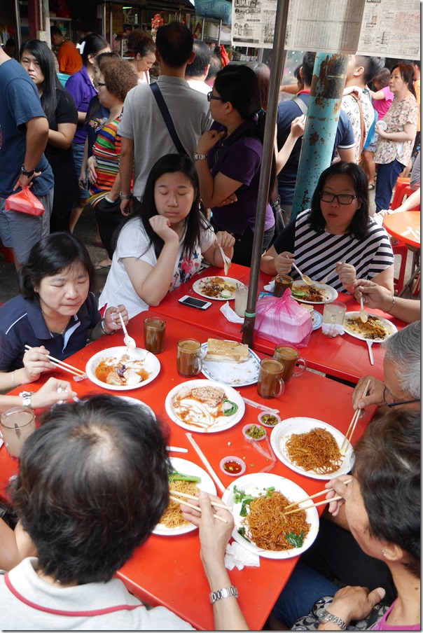 Breakfast with the family - tucking into wantan mee at Imbi Market