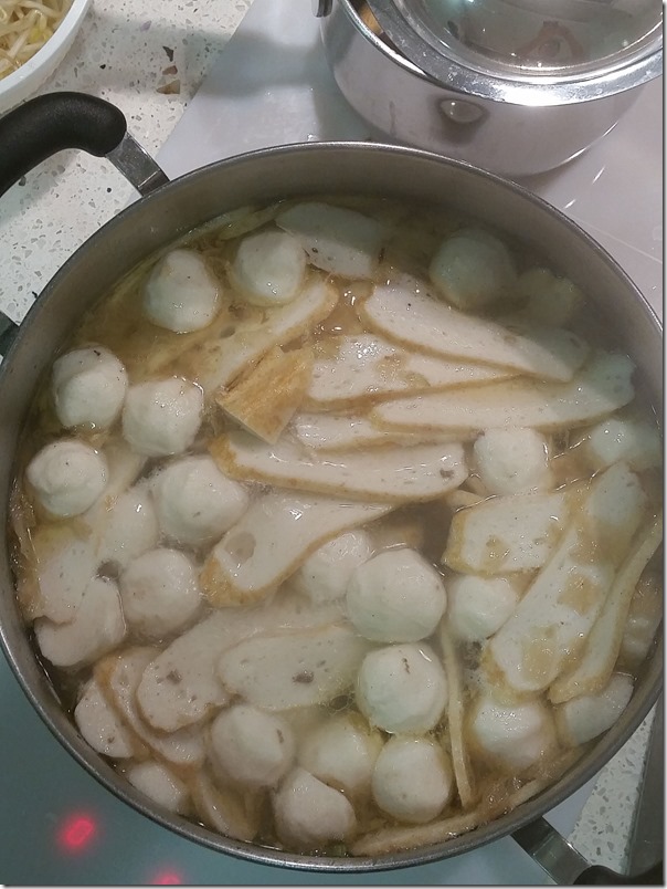 Fish balls and fish cake slices in chicken broth (Image taken with Samsung S5 mobile phone)