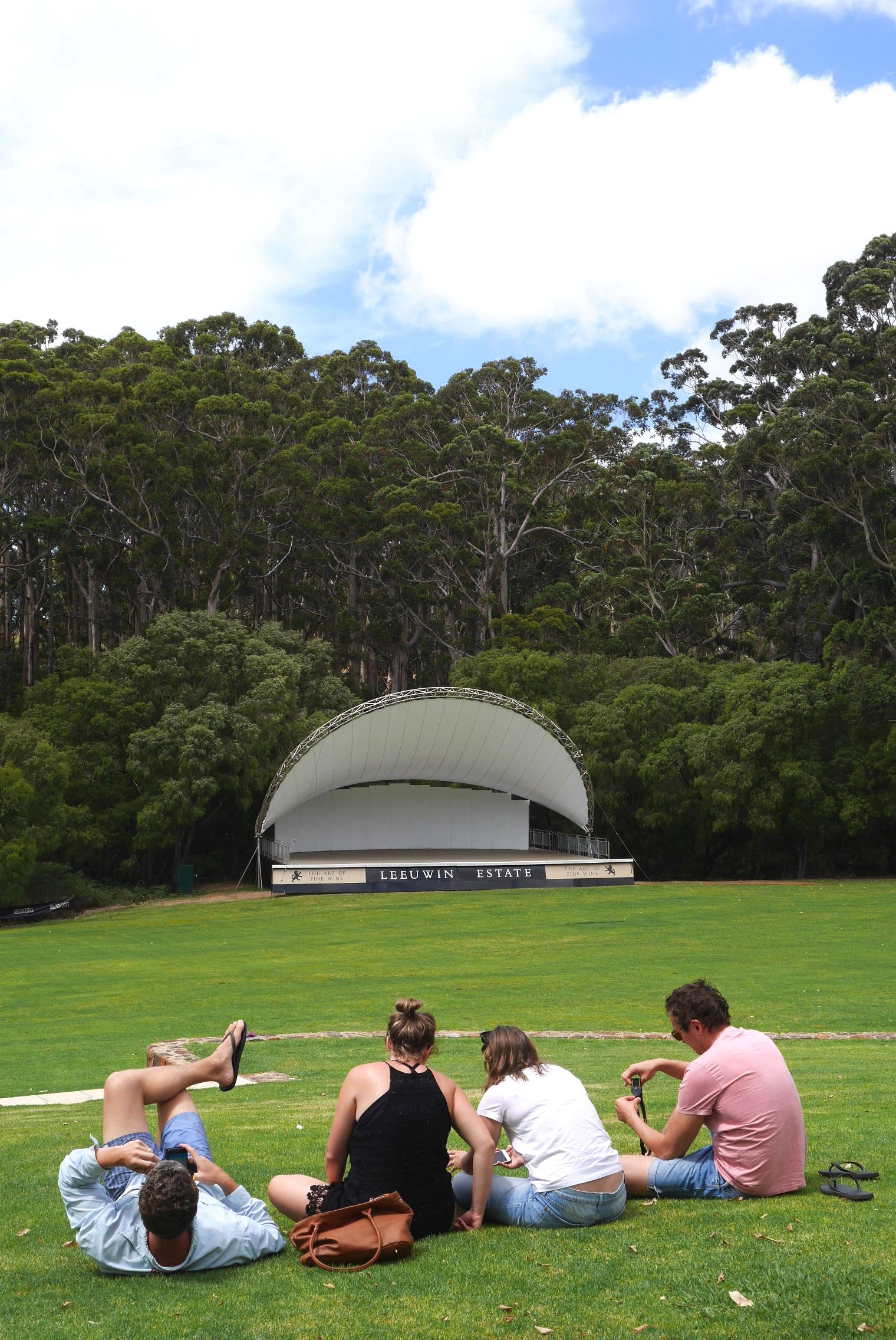 Lazing on the lawn and Leeuwin's iconic show stage in background